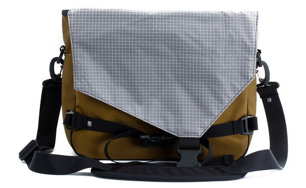 The Maker's Bag in Coyote (brown) 525 Ballistic with a Northwest Sky (light grey with white grid) 200 Halcyon interior.